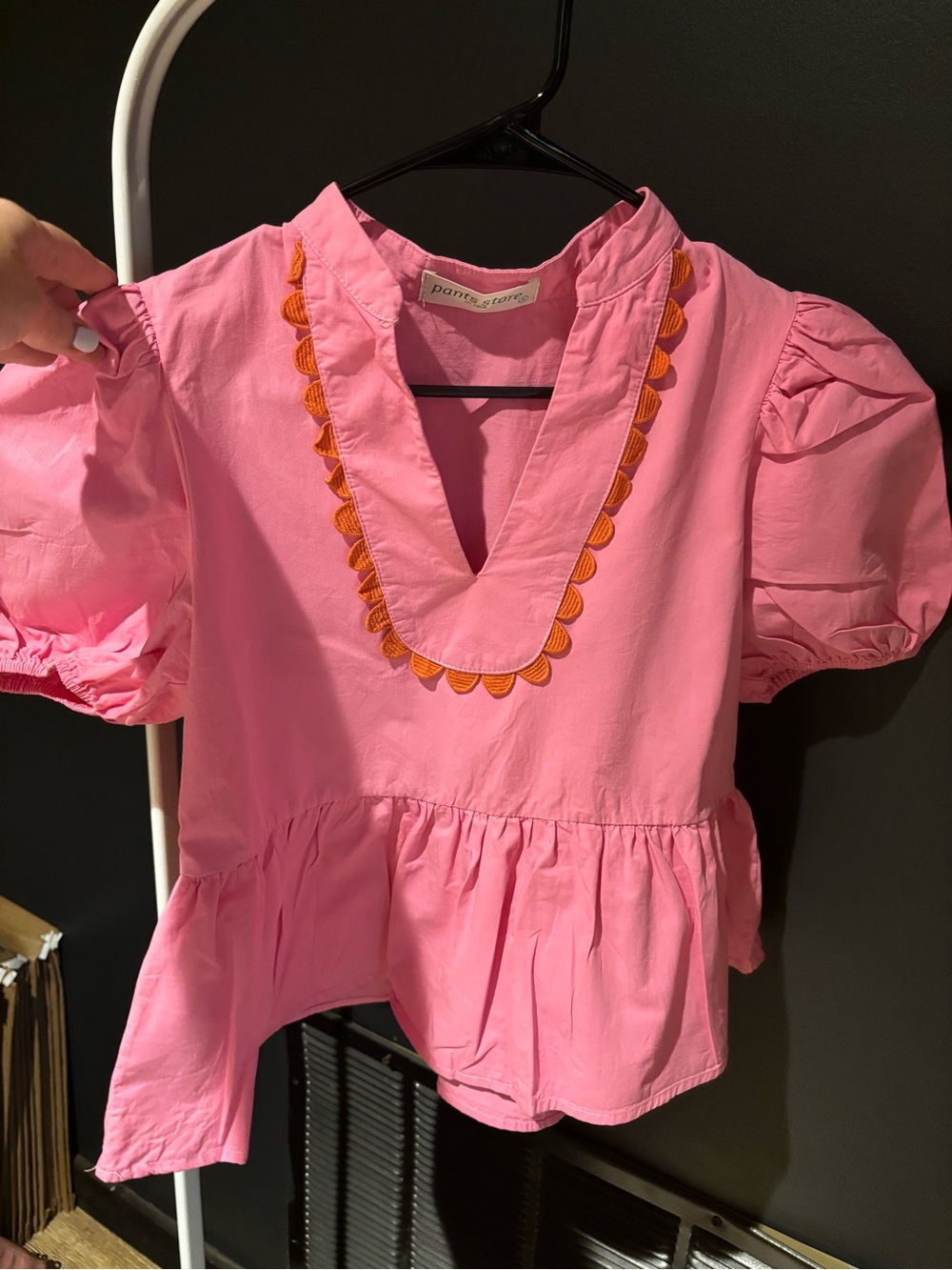 Pants Store Pink Peplum Top with Orange Trim